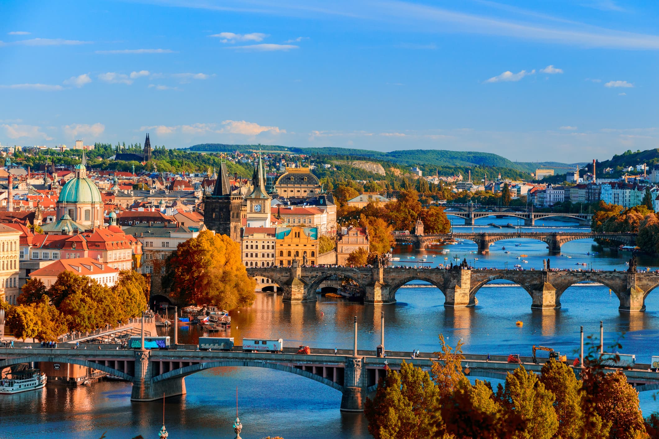 A vibrant city skyline with iconic landmarks and bustling streets, showcasing urban energy and charm